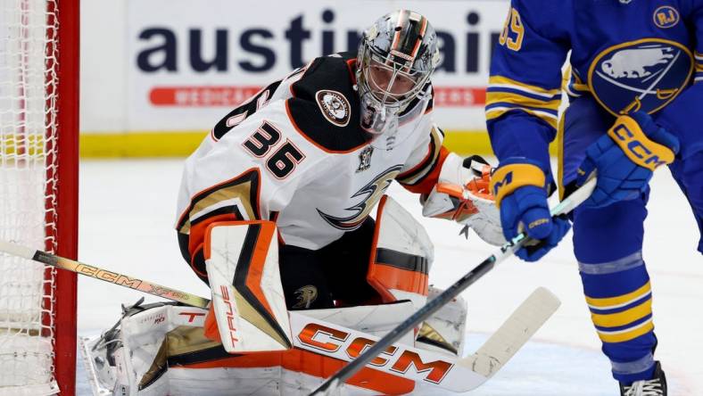 Feb 19, 2024; Buffalo, New York, USA;  Anaheim Ducks goaltender John Gibson (36) looks for the puck during the second period against the Buffalo Sabres at KeyBank Center. Mandatory Credit: Timothy T. Ludwig-USA TODAY Sports