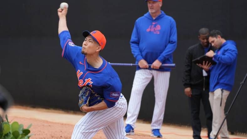 Feb 19, 2024; Port St. Lucie, FL, USA; New York Mets starting pitcher Kodai Senga (34) warms-up during workouts at spring training. Mandatory Credit: Jim Rassol-USA TODAY Sports