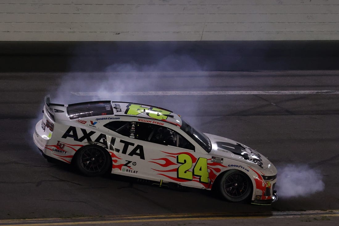 Feb 19, 2024; Daytona Beach, Florida, USA; NASCAR Cup Series driver William Byron (24) does a burn out after winning the Daytona 500 at Daytona International Speedway.  Mandatory Credit: Peter Casey-USA TODAY Sports