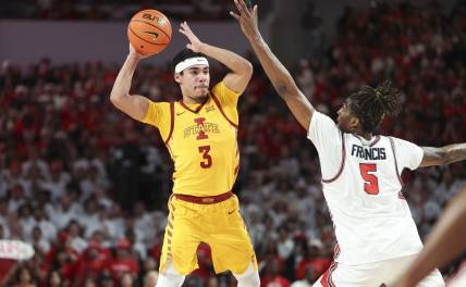 Feb 19, 2024; Houston, Texas, USA; Iowa State Cyclones guard Tamin Lipsey (3) looks to pass the ball as Houston Cougars forward Ja'Vier Francis (5) defends during the first half at Fertitta Center. Mandatory Credit: Troy Taormina-USA TODAY Sports