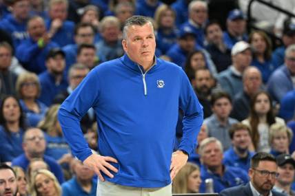 Feb 20, 2024; Omaha, Nebraska, USA; Creighton Bluejays head coach Greg McDermott watches action against the Connecticut Huskies in the first half at CHI Health Center Omaha. Mandatory Credit: Steven Branscombe-USA TODAY Sports