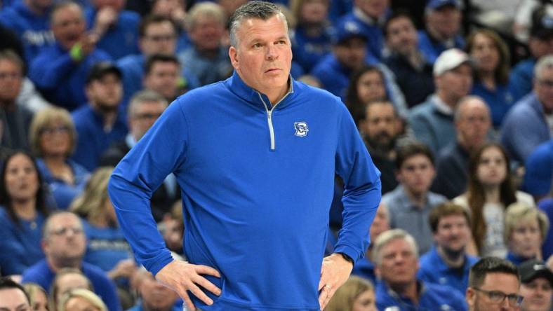 Feb 20, 2024; Omaha, Nebraska, USA; Creighton Bluejays head coach Greg McDermott watches action against the Connecticut Huskies in the first half at CHI Health Center Omaha. Mandatory Credit: Steven Branscombe-USA TODAY Sports