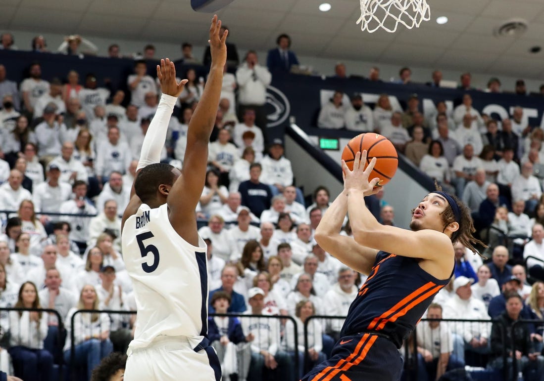 Feb 21, 2024; University Park, Pennsylvania, USA; Illinois Fighting Illini guard Dra Gibbs-Lawhorn (2) drives against Penn State Nittany Lions guard Jameel Brown (5) during the first half at Rec Hall. Mandatory Credit: Matthew O'Haren-USA TODAY Sports