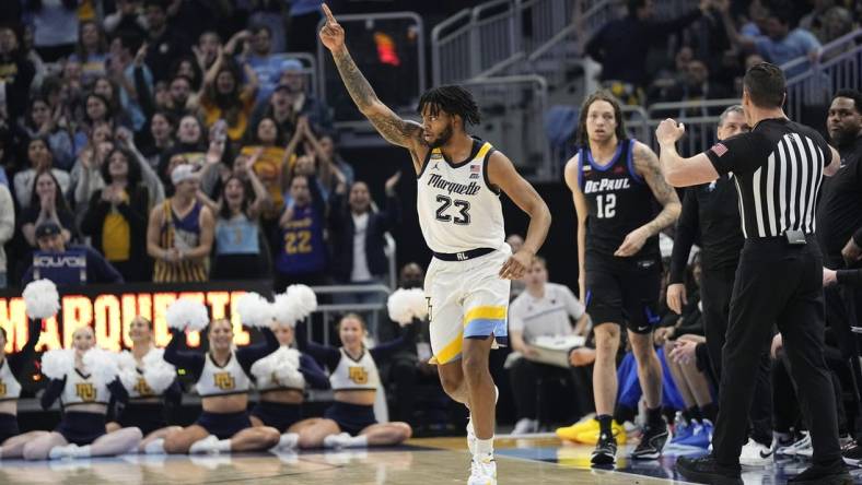 Feb 21, 2024; Milwaukee, Wisconsin, USA;  Marquette Golden Eagles forward David Joplin (23) celebrates after scoring a basket during the first half against the DePaul Blue Demons at Fiserv Forum. Mandatory Credit: Jeff Hanisch-USA TODAY Sports