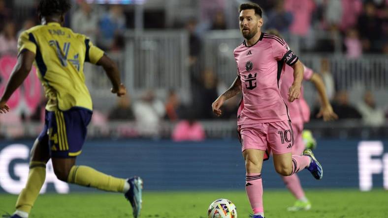 Feb 21, 2024; Fort Lauderdale, Florida, USA; Inter Miami CF forward Lionel Messi (10) kicks the ball against Real Salt Lake during the second half at Chase Stadium. Mandatory Credit: Nathan Ray Seebeck-USA TODAY Sports