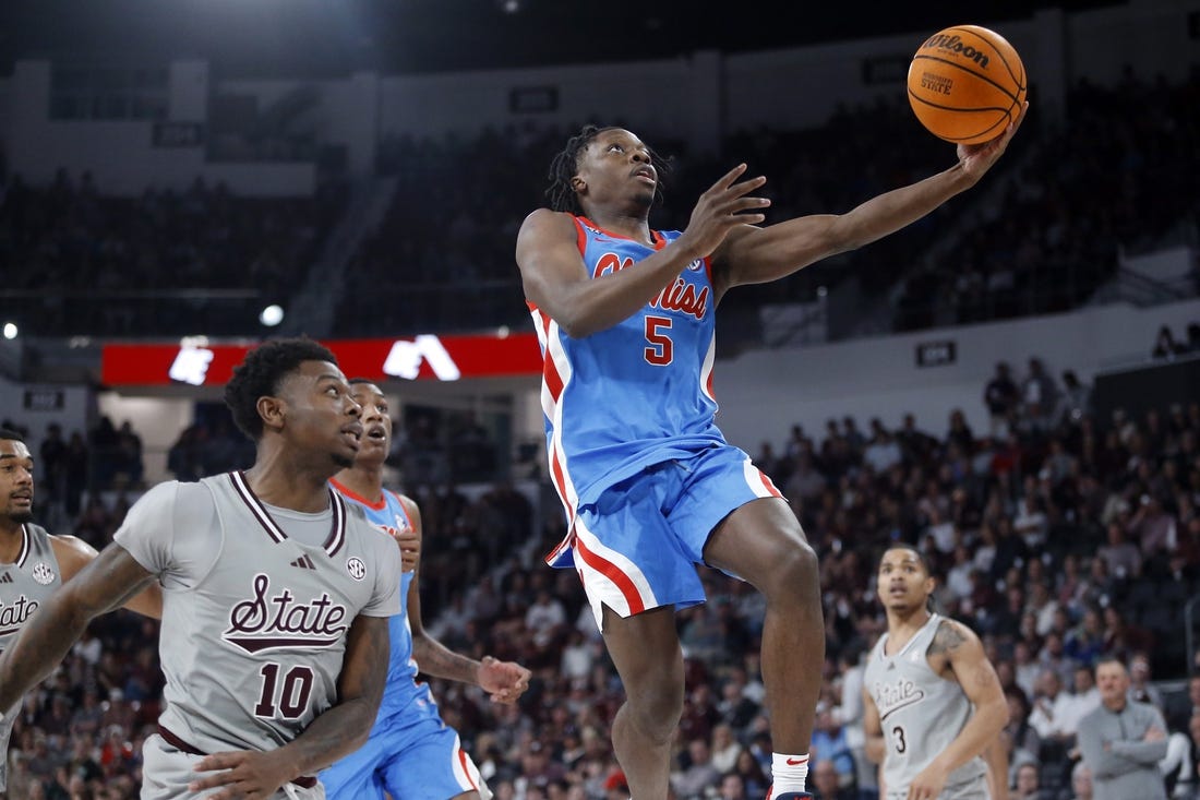 Feb 21, 2024; Starkville, Mississippi, USA; Mississippi Rebels guard Jaylen Murray (5) shoots during the first half against the Mississippi State Bulldogs at Humphrey Coliseum. Mandatory Credit: Petre Thomas-USA TODAY Sports