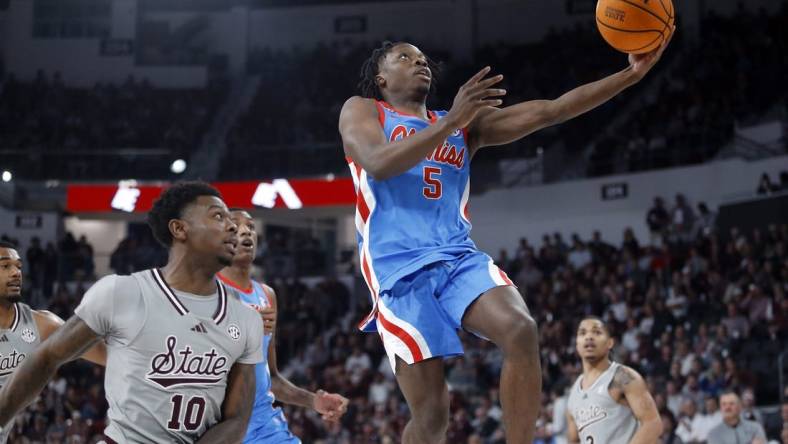 Feb 21, 2024; Starkville, Mississippi, USA; Mississippi Rebels guard Jaylen Murray (5) shoots during the first half against the Mississippi State Bulldogs at Humphrey Coliseum. Mandatory Credit: Petre Thomas-USA TODAY Sports