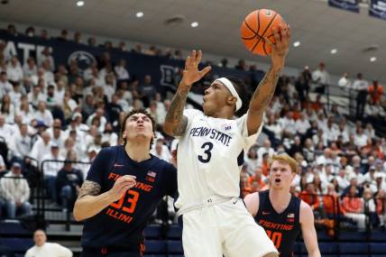 Feb 21, 2024; University Park, Pennsylvania, USA; Penn State Nittany Lions guard Nick Kern Jr (3) drives as Illinois Fighting Illini forward Coleman Hawkins (33) defends during the second half at Rec Hall. Penn State defeated Illinois 90-89. Mandatory Credit: Matthew O'Haren-USA TODAY Sports