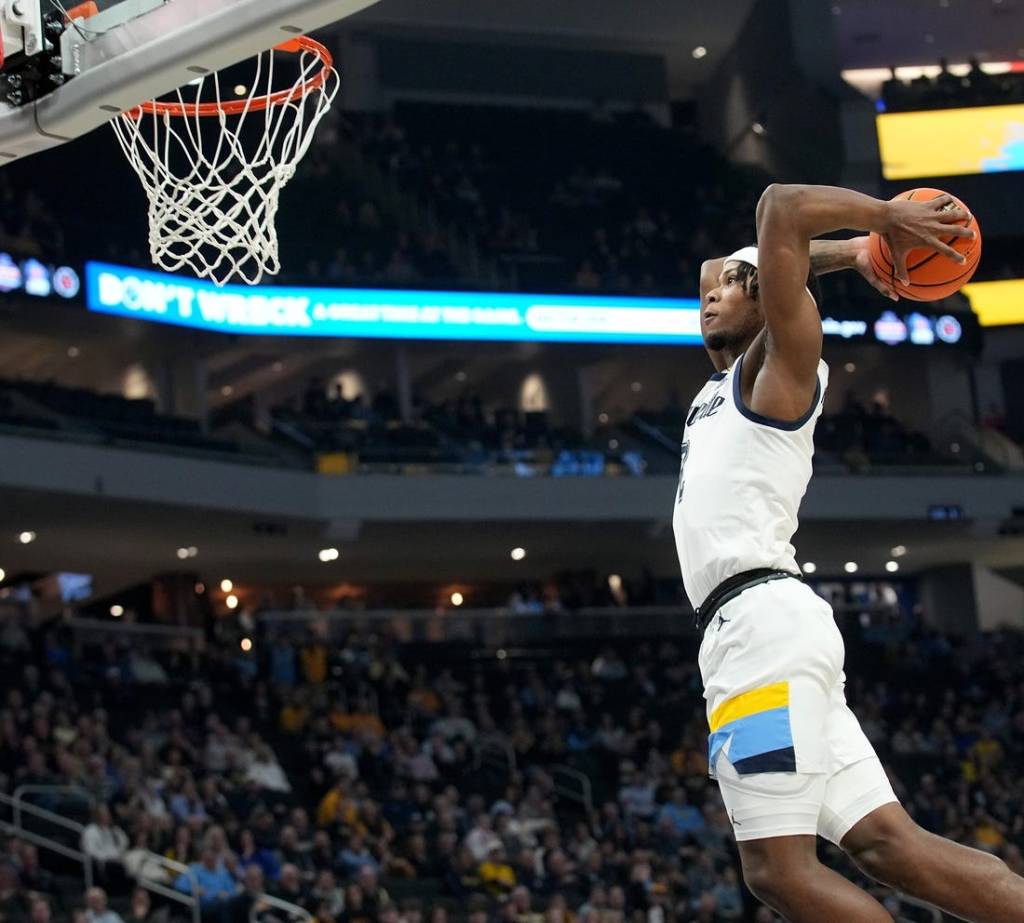 Marquette guard Chase Ross (2) dunks the ball after a steal during the first half of their game against DePaul Wednesday, February 21, 2024 at Fiserv Forum in Milwaukee, Wisconsin.