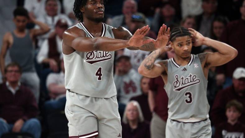 Feb 21, 2024; Starkville, Mississippi, USA; Mississippi State Bulldogs forward Cameron Matthews (4) and guard Shakeel Moore (3) react during the second half against the Mississippi Rebels at Humphrey Coliseum. Mandatory Credit: Petre Thomas-USA TODAY Sports