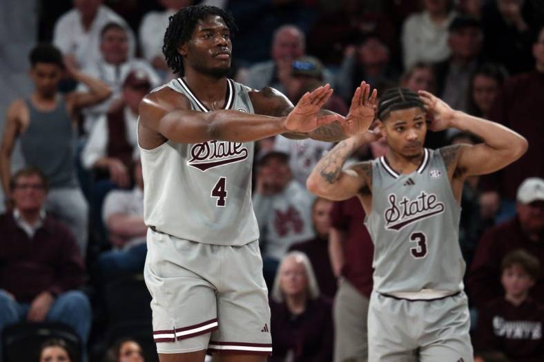 Feb 21, 2024; Starkville, Mississippi, USA; Mississippi State Bulldogs forward Cameron Matthews (4) and guard Shakeel Moore (3) react during the second half against the Mississippi Rebels at Humphrey Coliseum. Mandatory Credit: Petre Thomas-USA TODAY Sports