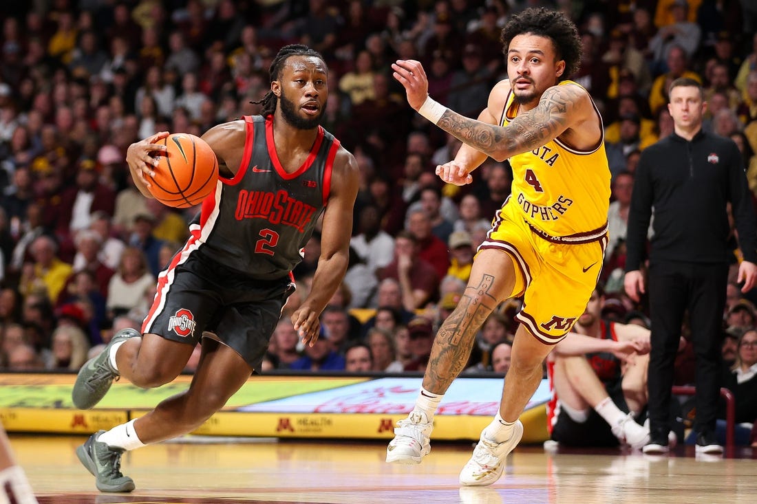 Feb 22, 2024; Minneapolis, Minnesota, USA; Ohio State Buckeyes guard Bruce Thornton (2) works toward the basket as Minnesota Golden Gophers guard Braeden Carrington (4) defends during the second half at Williams Arena. Mandatory Credit: Matt Krohn-USA TODAY Sports