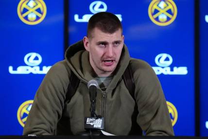 Feb 22, 2024; Denver, Colorado, USA; Denver Nuggets center Nikola Jokic (15) speaks to the media following the win over the Washington Wizards at Ball Arena. Mandatory Credit: Ron Chenoy-USA TODAY Sports