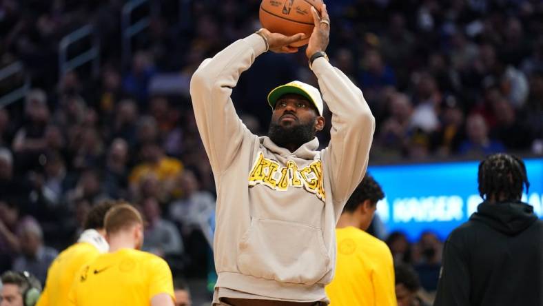 Feb 22, 2024; San Francisco, California, USA; Los Angeles Lakers forward Lebron James (23) shoots the ball during a timeout against the Golden State Warriors in the third quarter at the Chase Center. Mandatory Credit: Cary Edmondson-USA TODAY Sports