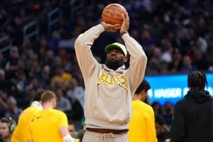 Feb 22, 2024; San Francisco, California, USA; Los Angeles Lakers forward Lebron James (23) shoots the ball during a timeout against the Golden State Warriors in the third quarter at the Chase Center. Mandatory Credit: Cary Edmondson-USA TODAY Sports