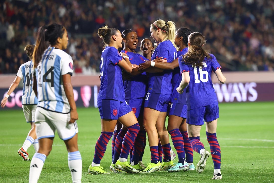 Feb 23, 2024; Carson, California, USA; United States midfielder Jaedyn Shaw (8) celebrates with teammates after scoring a goal against Argentina during the first half at Dignity Health Sports Park. Mandatory Credit: Jessica Alcheh-USA TODAY Sports