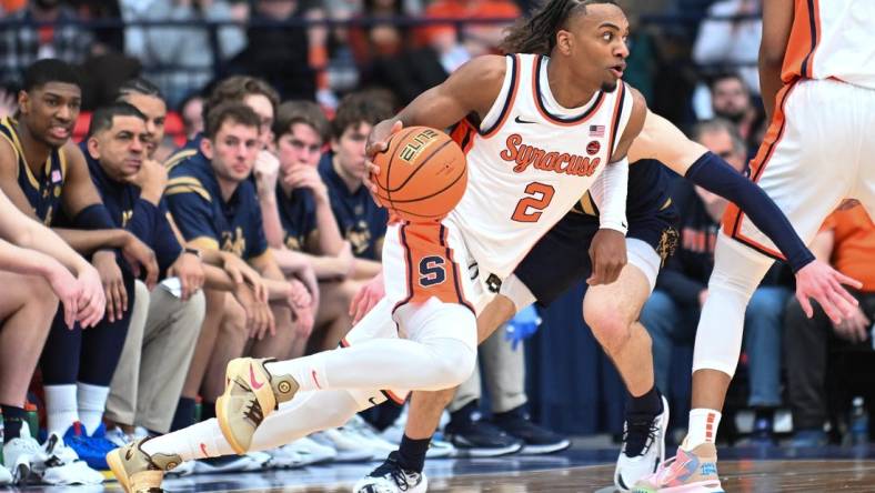 Feb 24, 2024; Syracuse, New York, USA; Syracuse Orange guard JJ Starling (2) drives the ball to the basket against the Notre Dame Fighting Irish in the first half at the JMA Wireless Dome. Mandatory Credit: Mark Konezny-USA TODAY Sports