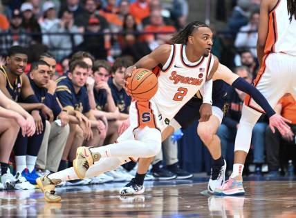 Feb 24, 2024; Syracuse, New York, USA; Syracuse Orange guard JJ Starling (2) drives the ball to the basket against the Notre Dame Fighting Irish in the first half at the JMA Wireless Dome. Mandatory Credit: Mark Konezny-USA TODAY Sports