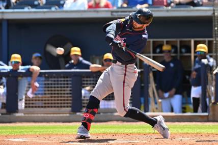 Feb 24, 2024; Port Charlotte, Florida, USA; Atlanta Braves right fielder Forrest Wall (73) hits a RBI single in the second inning of a spring training game against theTampa Bay Rays at Charlotte Sports Park. Mandatory Credit: Jonathan Dyer-USA TODAY Sports