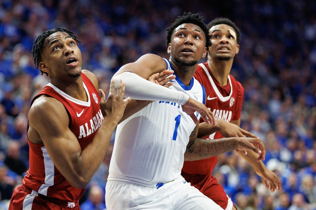 Feb 24, 2024; Lexington, Kentucky, USA; Kentucky Wildcats guard Justin Edwards (1) jostles for position under the basket as a teammate shoots a free throw during the second half against the Alabama Crimson Tide at Rupp Arena at Central Bank Center. Mandatory Credit: Jordan Prather-USA TODAY Sports