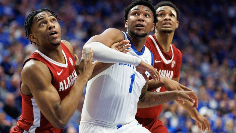 Feb 24, 2024; Lexington, Kentucky, USA; Kentucky Wildcats guard Justin Edwards (1) jostles for position under the basket as a teammate shoots a free throw during the second half against the Alabama Crimson Tide at Rupp Arena at Central Bank Center. Mandatory Credit: Jordan Prather-USA TODAY Sports