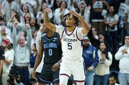 Feb 24, 2024; Storrs, Connecticut, USA; UConn Huskies guard Stephon Castle (5) reacts after his basket against the Villanova Wildcats in the first half at Harry A. Gampel Pavilion. Mandatory Credit: David Butler II-USA TODAY Sports