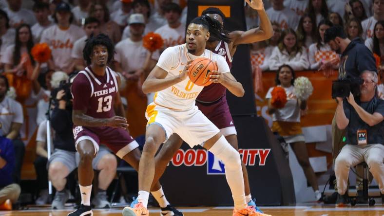 Feb 24, 2024; Knoxville, Tennessee, USA; Tennessee Volunteers forward Jonas Aidoo (0) looks to moves the ball against the Texas A&M Aggies during the first half at Thompson-Boling Arena at Food City Center. Mandatory Credit: Randy Sartin-USA TODAY Sports