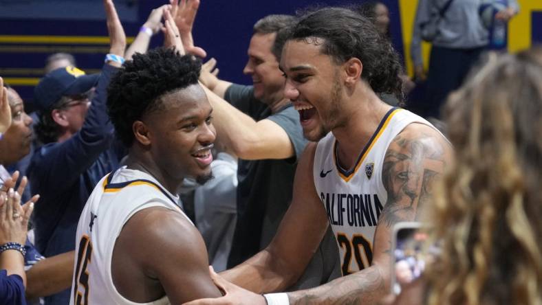 Feb 24, 2024; Berkeley, California, USA; California Golden Bears guard Jalen Cone (15) and guard Jaylon Tyson (20) celebrate after defeating the Oregon Ducks at Haas Pavilion. Mandatory Credit: Darren Yamashita-USA TODAY Sports