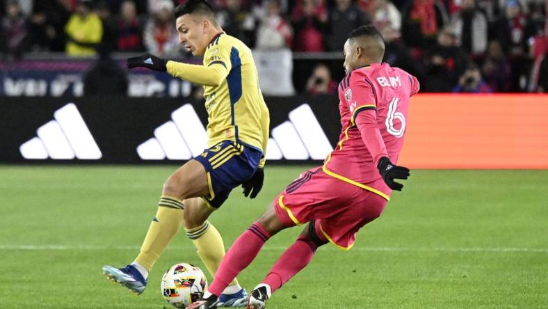 Feb 24, 2024; St. Louis, Missouri, USA; Seattle Sounders FC midfielder Joao Paulo (6) kicks the ball away from Real Salt Lake during the first half at CITYPARK. Mandatory Credit: Scott Rovak-USA TODAY Sports