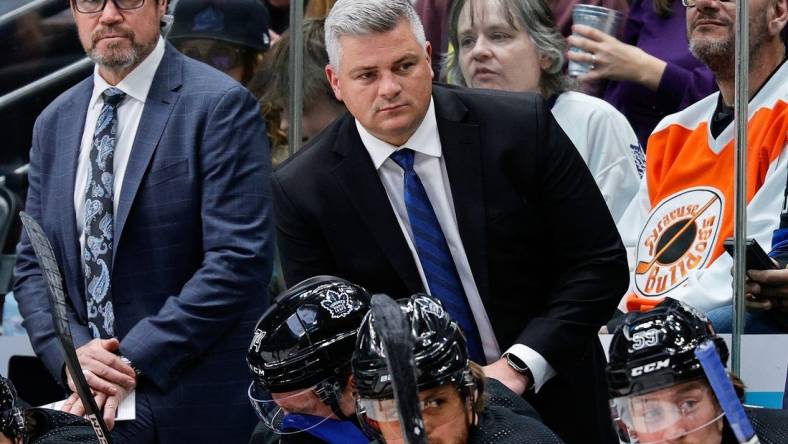 Feb 24, 2024; Denver, Colorado, USA; Toronto Maple Leafs head coach Sheldon Keefe looks on in the first period against the Colorado Avalanche at Ball Arena. Mandatory Credit: Isaiah J. Downing-USA TODAY Sports