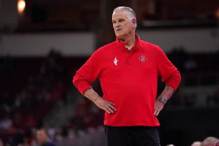 Feb 24, 2024; Fresno, California, USA; San Diego State Aztecs head coach Brian Dutcher watches action against the Fresno State Bulldogs in the second half at the Save Mart Center. Mandatory Credit: Cary Edmondson-USA TODAY Sports