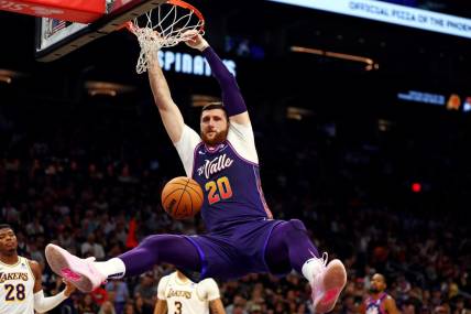 Feb 25, 2024; Phoenix, Arizona, USA; Phoenix Suns center Jusuf Nurkic (20) dunks the ball during the second quarter of the game against the Los Angeles Lakers at Footprint Center. Mandatory Credit: Mark J. Rebilas-USA TODAY Sports
