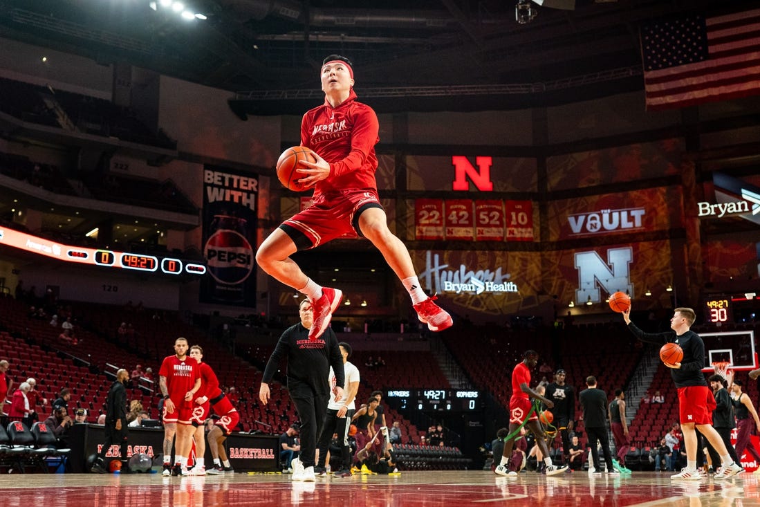 Feb 25, 2024; Lincoln, Nebraska, USA; Nebraska Cornhuskers guard Keisei Tominaga (30) jumps during warmups before the game against the Minnesota Golden Gophers at Pinnacle Bank Arena. Mandatory Credit: Dylan Widger-USA TODAY Sports