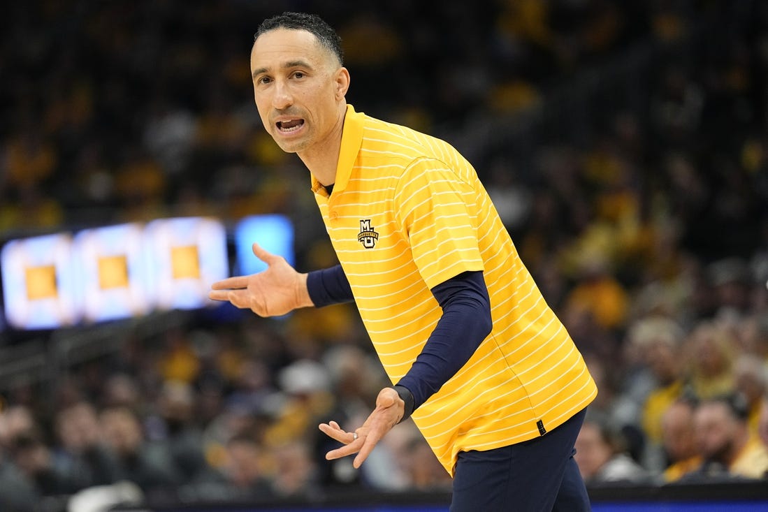 Feb 25, 2024; Milwaukee, Wisconsin, USA;  Marquette Golden Eagles head coach Shaka Smart reacts to a call during the first half against the Xavier Musketeers at Fiserv Forum. Mandatory Credit: Jeff Hanisch-USA TODAY Sports