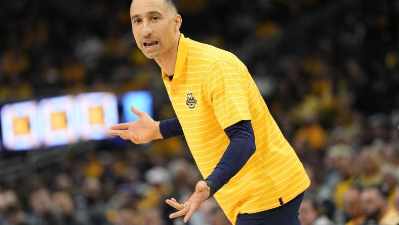 Feb 25, 2024; Milwaukee, Wisconsin, USA;  Marquette Golden Eagles head coach Shaka Smart reacts to a call during the first half against the Xavier Musketeers at Fiserv Forum. Mandatory Credit: Jeff Hanisch-USA TODAY Sports