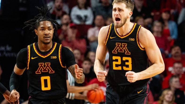 Feb 25, 2024; Lincoln, Nebraska, USA; Minnesota Golden Gophers forward Parker Fox (23) celebrates after dunking the ball against the Nebraska Cornhuskers during the first half at Pinnacle Bank Arena. Mandatory Credit: Dylan Widger-USA TODAY Sports