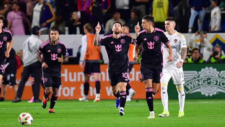 Feb 25, 2024; Carson, California, USA;  Inter Miami CF forward Lionel Messi (10) celebrates his goal scored against the LA Galaxy during the second half at Dignity Health Sports Park. Mandatory Credit: Gary A. Vasquez-USA TODAY Sports