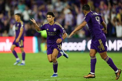 Feb 27, 2024; Orlando, FL, USA;  Orlando City forward Ramiro Enrique (7) celebrates after scoring a goal agaisnt Cavalry FC in the second half during a Concacaf Champions Cup match at Inter&Co Stadium. Mandatory Credit: Nathan Ray Seebeck-USA TODAY Sports