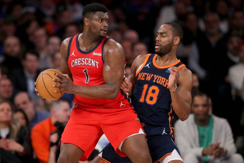 Feb 27, 2024; New York, New York, USA; New Orleans Pelicans forward Zion Williamson (1) controls the ball against New York Knicks guard Alec Burks (18) during the second quarter at Madison Square Garden. Mandatory Credit: Brad Penner-USA TODAY Sports