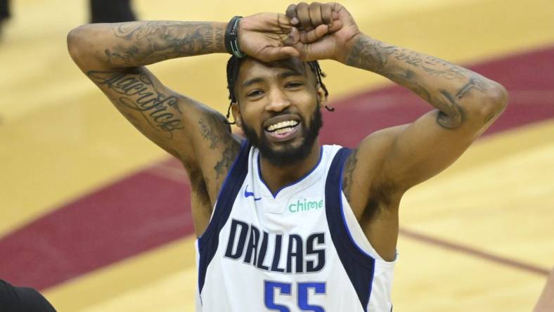 Feb 27, 2024; Cleveland, Ohio, USA; Dallas Mavericks forward Derrick Jones Jr. (55) reacts in the fourth quarter against the Cleveland Cavaliers at Rocket Mortgage FieldHouse. Mandatory Credit: David Richard-USA TODAY Sports