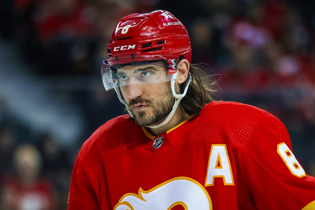 Feb 27, 2024; Calgary, Alberta, CAN; Calgary Flames defenseman Chris Tanev (8) against the Los Angeles Kings during the first period at Scotiabank Saddledome. Mandatory Credit: Sergei Belski-USA TODAY Sports