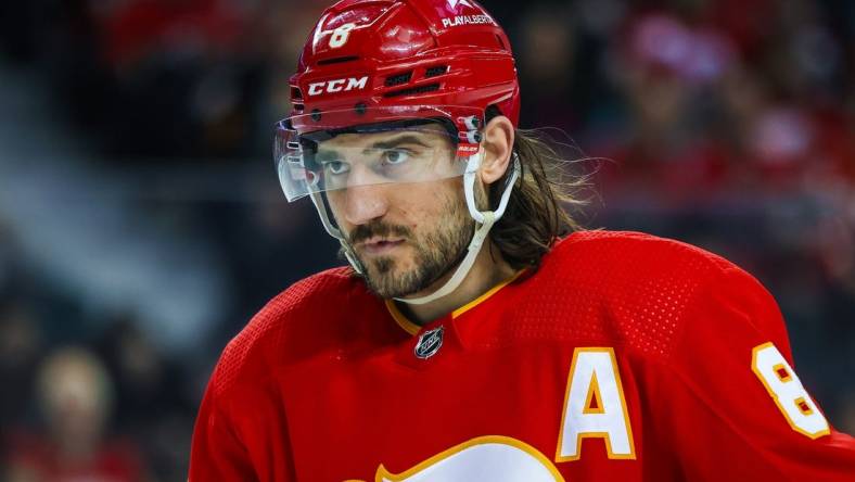 Feb 27, 2024; Calgary, Alberta, CAN; Calgary Flames defenseman Chris Tanev (8) against the Los Angeles Kings during the first period at Scotiabank Saddledome. Mandatory Credit: Sergei Belski-USA TODAY Sports