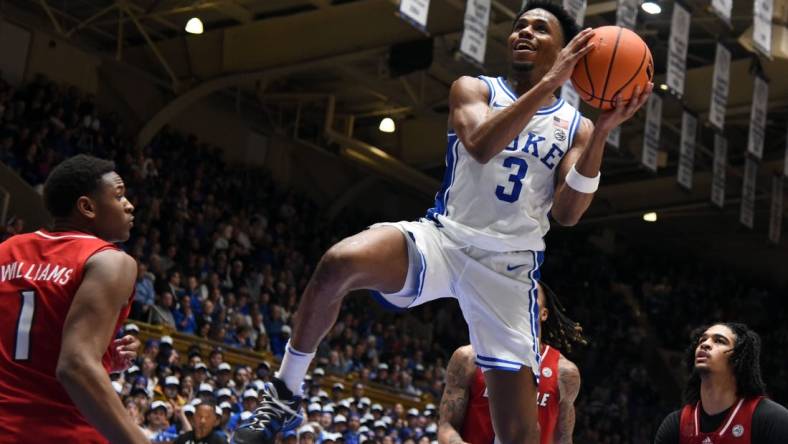 Feb 28, 2024; Durham, North Carolina, USA; Duke Blue Devils guard Jeremy Roach (3) drives to the basket during the second half against the Louisville Cardinals at Cameron Indoor Stadium.  Mandatory Credit: Rob Kinnan-USA TODAY Sports