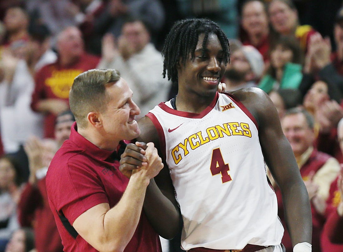 Iowa State Cyclones men's basketball head coach T. J. Otzelberger congratulates Iowa State Cyclones guard Demarion Watson (4) after winning 58-45 over Oklahoma Sooners in the Big-12 conference showdown at Hilton Coliseum on Wednesday, Feb. 28, 2024, in Ames, Iowa.