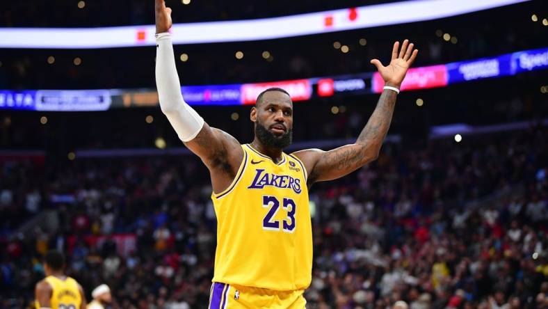 Feb 28, 2024; Los Angeles, California, USA; Los Angeles Lakers forward LeBron James (23) celebrates the victory against the Los Angeles Clippers at Crypto.com Arena. Mandatory Credit: Gary A. Vasquez-USA TODAY Sports