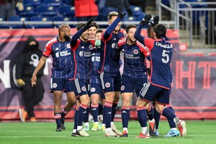 Feb 29, 2024; Foxborough, MA, USA; The New England Revolution react after a goal was scored by midfielder Nacho Gil (21) during the first half of a match against the Club Atletico Independiente at Gillette Stadium. Mandatory Credit: Brian Fluharty-USA TODAY Sports