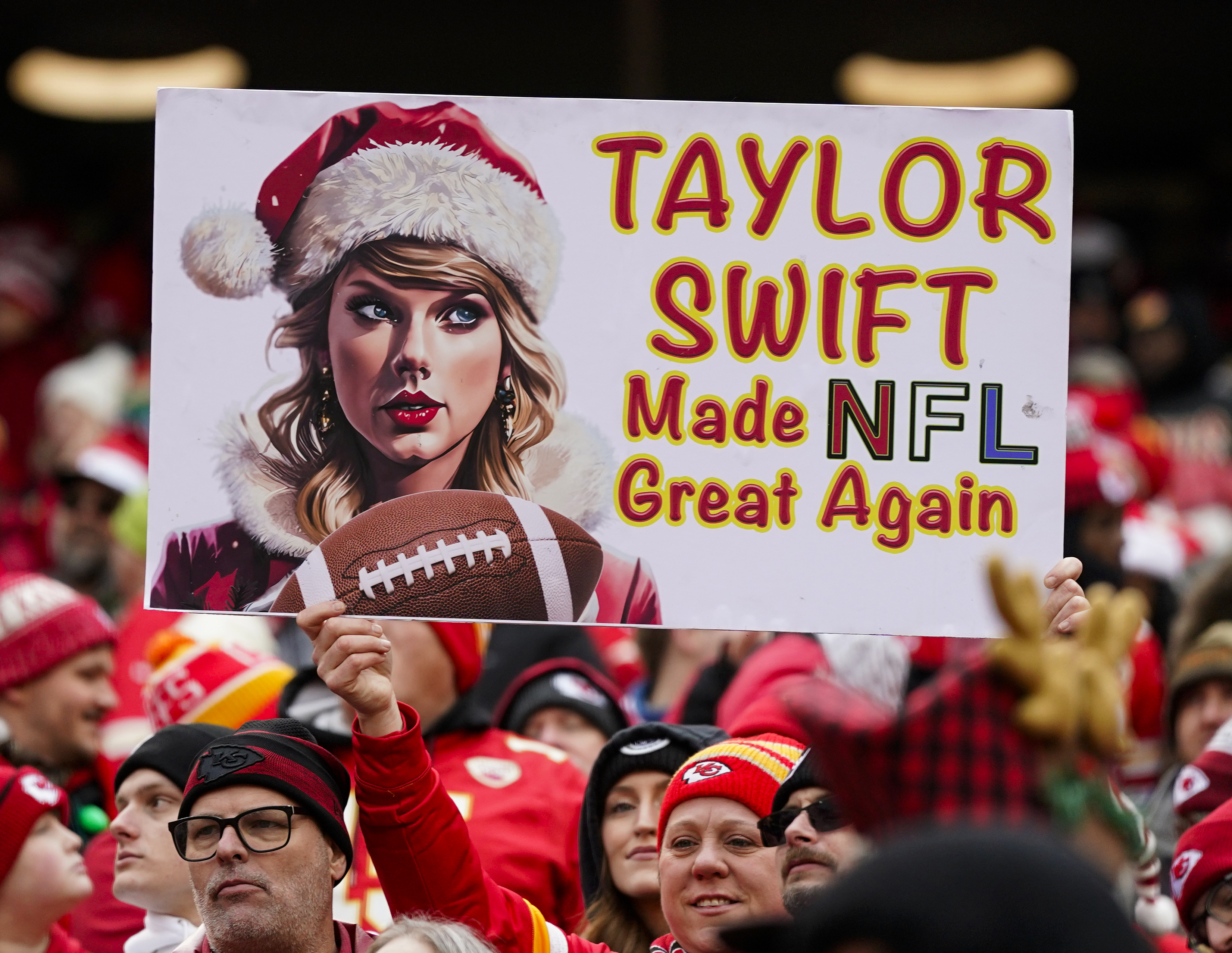 Taylor Swift sign at NFL game