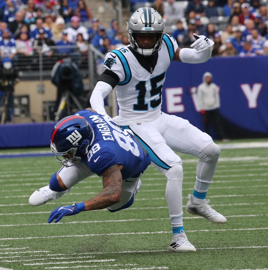 Evan Engram of the Giants is chased down and tackled by C.J. Henderson of Carolina in the first half as the Carolina Panthers faced the New York Giants at MetLife Stadium in East Rutherford, NJ on October 24, 2021.

The Carolina Panthers Faced The New York Giants At Metlife Stadium In East Rutherford Nj On October 24 2021