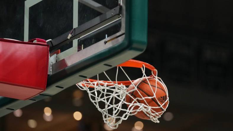 Dec 20, 2021; Coral Gables, Florida, USA; A general view as a basketball goes through the hoop as the Stetson Hatters warm up prior to the game against the Miami Hurricanes at Watsco Center. Mandatory Credit: Jasen Vinlove-USA TODAY Sports