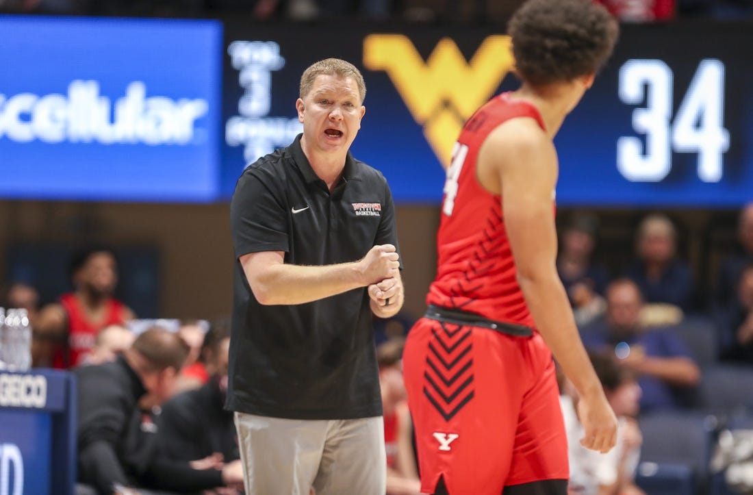 Dec 22, 2021; Morgantown, West Virginia, USA; Youngstown State Penguins head coach Jerrod Calhoun calls out a play during the second half against the West Virginia Mountaineers at WVU Coliseum. Mandatory Credit: Ben Queen-USA TODAY Sports
